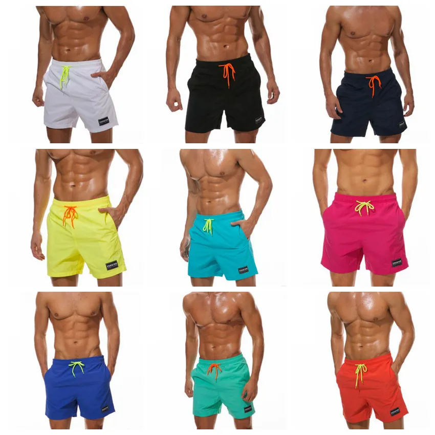 Мужчины брюки бег трусцой тренажерный зал шорты Бегун фитнес брюки мужчины твердые шорты мода летние шорты пляж повседневные брюки плавки домашняя одежда LDH51