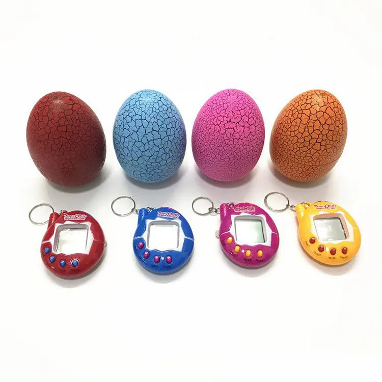 2021 nuovi giocatori di giochi elettronici portatili Tamagotchi Tumbler giocattolo perfetto i bambini regalo di compleanno uovo di dinosauro animali virtuali su un portachiavi animale domestico digitale