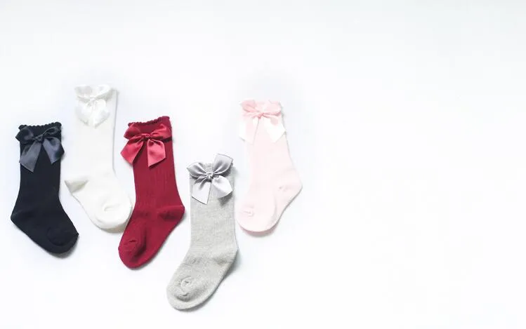 Bébé filles genou chaussettes hautes enfant enfants mignon dentelle arcs princesse jambières solide coton chaussette nouveau bébé fille longues chaussettes 0-4YY