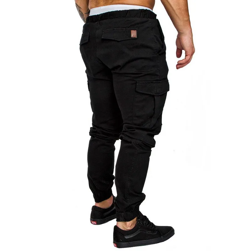 2018 Plus Size Men New Casual Pants Sporting Joggers Trousers Black Fitness Gym Clothing Pockets Leisure Sweatpants C18111201 From 16 27 DHgate
