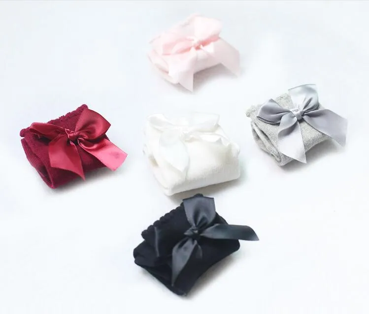 Bébé filles genou chaussettes hautes enfant enfants mignon dentelle arcs princesse jambières solide coton chaussette nouveau bébé fille longues chaussettes 0-4YY