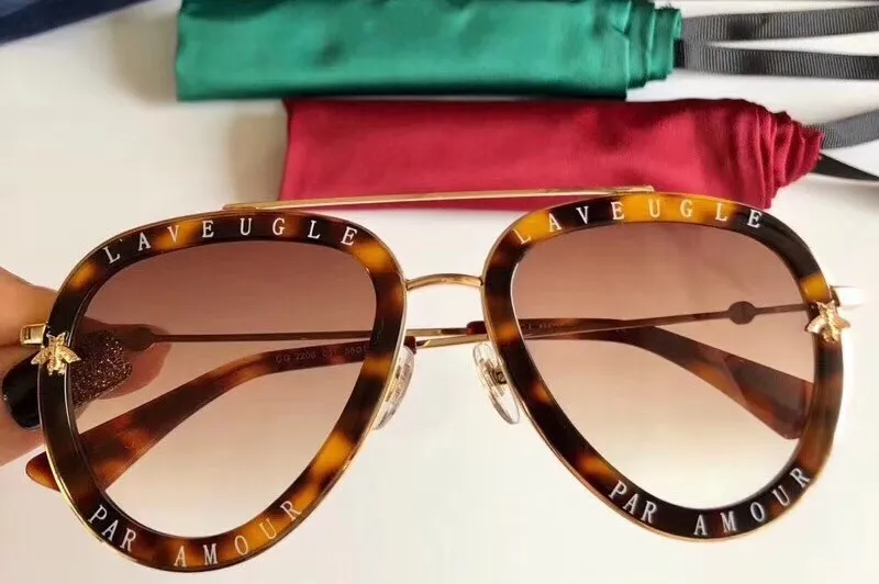 Nuovi occhiali da sole da uomo di alta qualità 2208 occhiali da sole da uomo occhiali da sole da donna stile di moda protegge gli occhi Gafas de sol lunettes de soleil con scatola