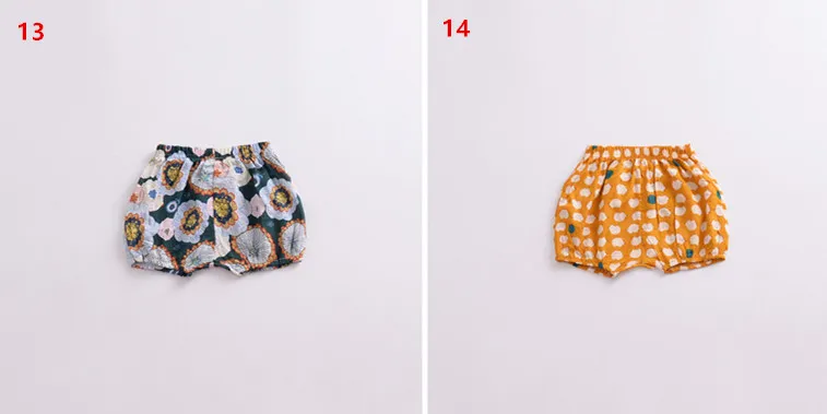 綿の赤ちゃんキッズショートパンツ2018夏の子供のハーレムのショートパンツ男の子の花の花の印刷ショーツカジュアル幼児の服の底部のブルーマー