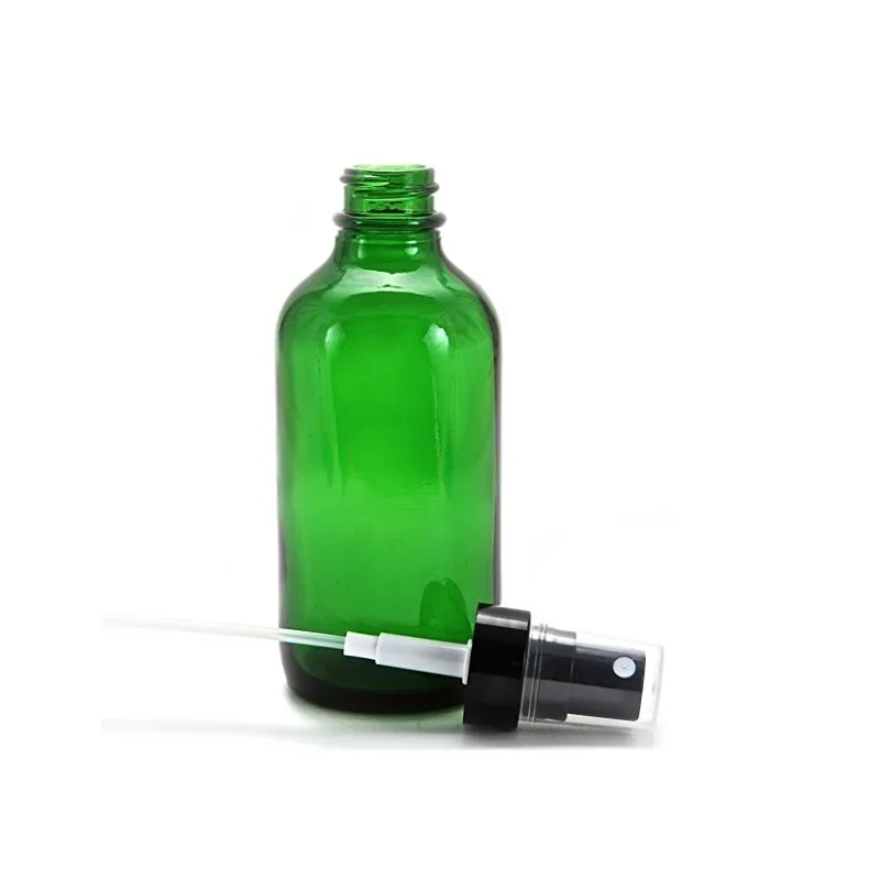 Bottiglie bottiglie di vetro verde con spruzzatore a pompa nebulizzazione fine nero progettato oli essenziali profumi prodotti la pulizia bottiglie aromaterapia