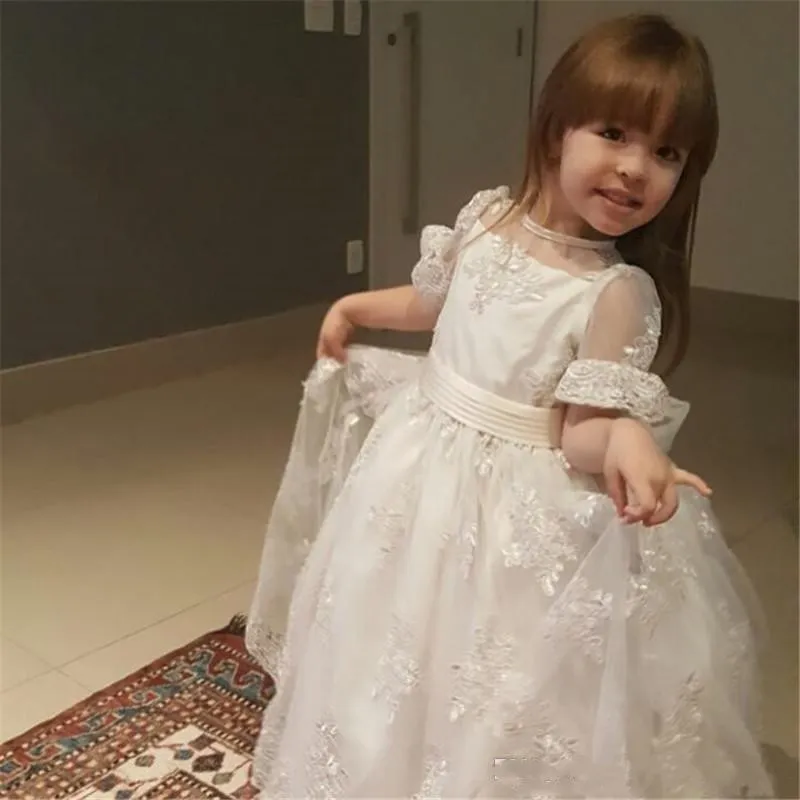 Vestidos de encaje para niñas con flores, escote transparente, mangas cortas, vestido de desfile para niñas, vestidos de primera comunión con lazo grande en la espalda