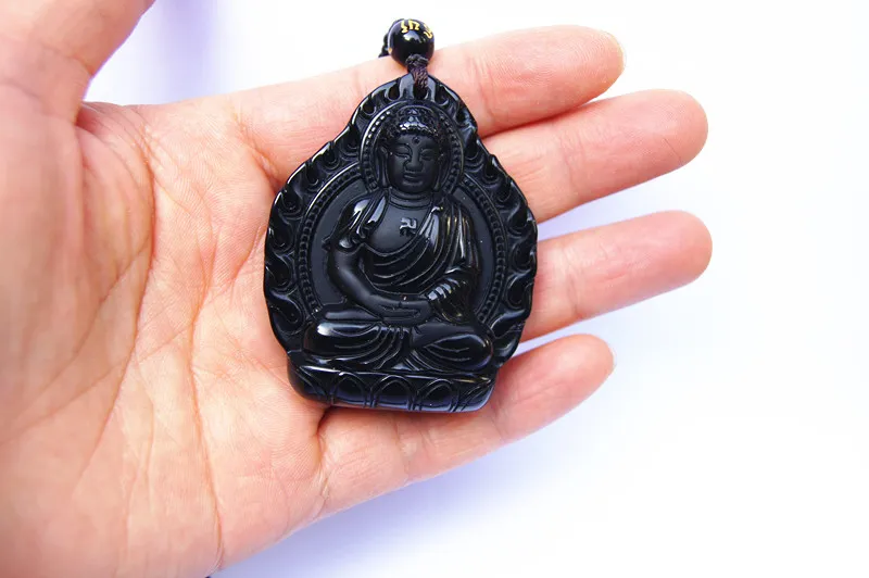Handgjord snidning av naturlig obsidian Buddha, ett flaskformat amuletthalsband, hänge.
