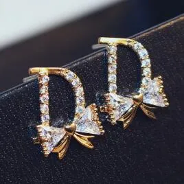 D-Letter Brand Stud-oorbellen Geplaatste 18K gouden micro-set zirkoon boog knoop high-end oorbellen Koreaanse mode zoete vrouwen voortreffelijke oorbellen sieraden Valentijnsdag cadeau spc