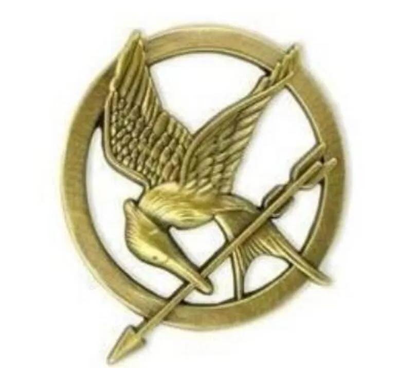 ホットムービーThe Hunger Games Mockingjayピンゴールドメッキ鳥と矢印ブローチギフト