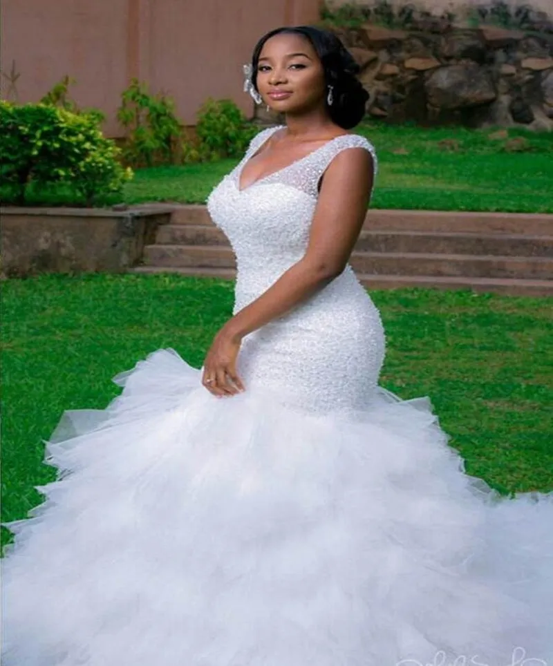 Plus Size Tiered mermaid wedding dress with V-Neck, Beaded Tiered Ruffles, Chapel Train, and Open Back
