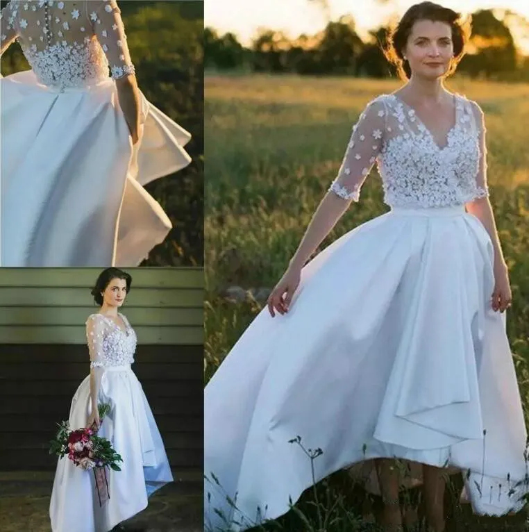 Oszałamiający wysokie niskie stroje ślubne ogrodowe Kwiatowa Koronka Saudyjska Arabia Plus Size Ball Custom Vestido de Novia Formalna suknia ślubna Arabska