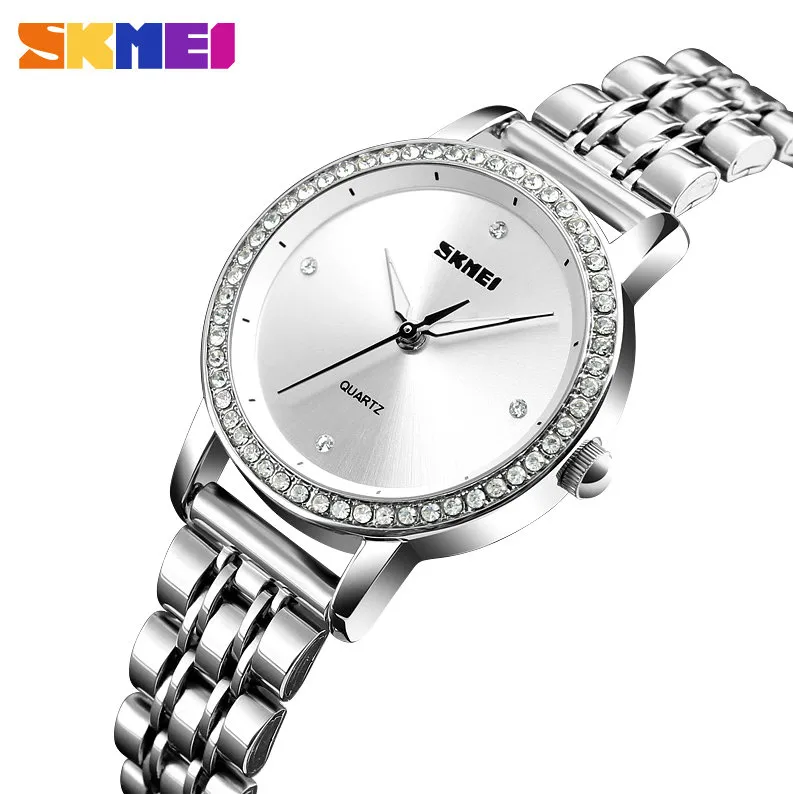 SKMEI Top Orologi da donna Orologio al quarzo Cinturino in acciaio inossidabile dorato rosa Orologio da polso da donna elegante in cristallo ghiacciato