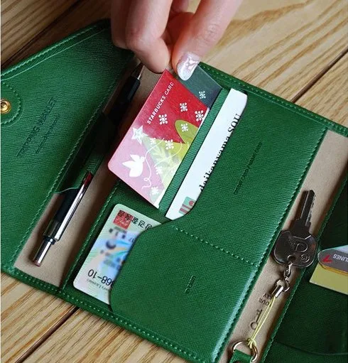 Een multifunctionele portemonnee. Dun zacht leer. Kort. Paspoortpakket. Reisdocumenten tas. Nul tas. Kaartzak. Mannen en vrouwen portemonnees.