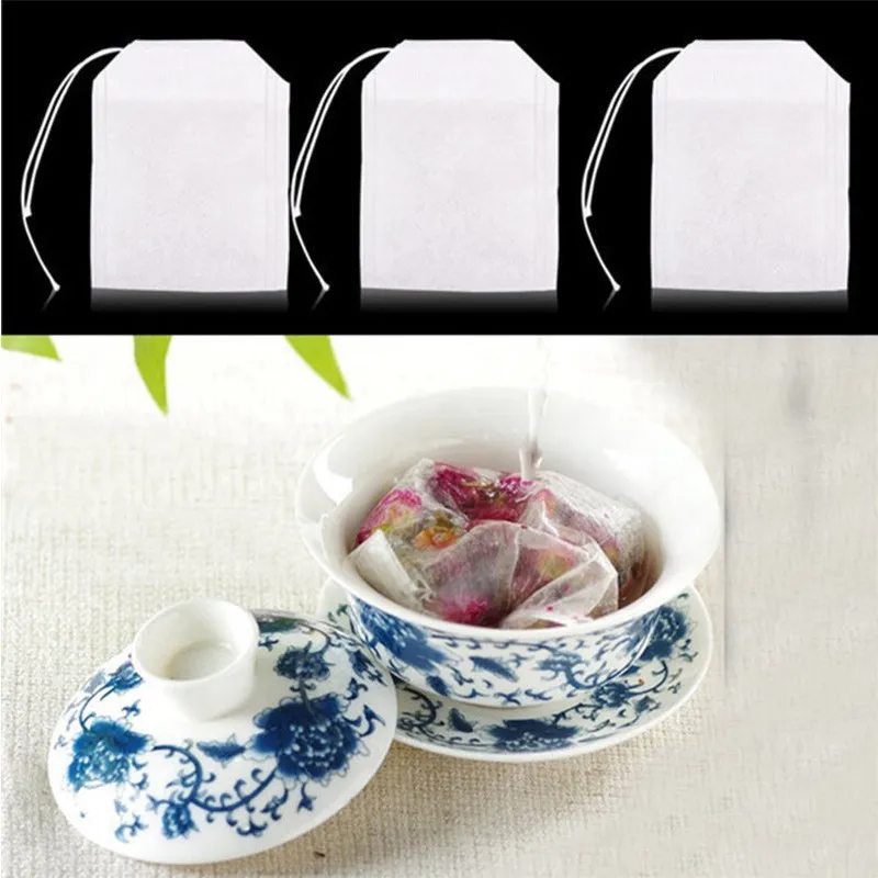100 pièces/paquet sachets de thé 5.5x7CM sachets de thé parfumés vides avec ficelle papier filtre scellé pour herbes thé en vrac Bolsas c392