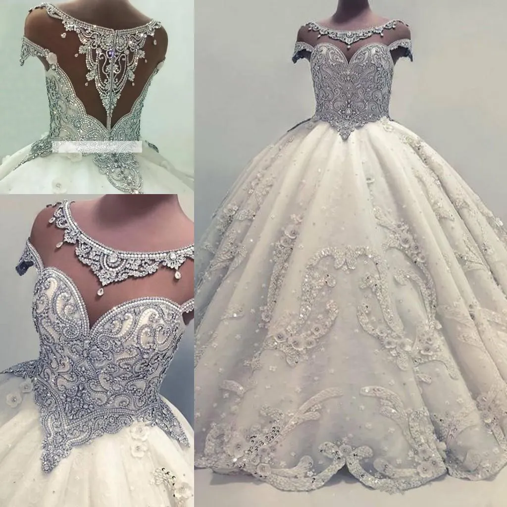 Designer Luxurious Beaded Crystals Arabic Princess Ballroom Wedding Gowns 2018 Latest Sheer Cap Sleeves Beading Sequins Puffy Long Bridal Gowns From Manweisi 324.61 DHgate.Com
