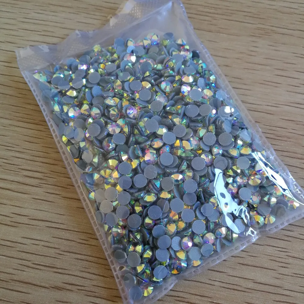 10 bolsas * 1440 piezas ss20 (4,6-4,8mm) diamantes de imitación de cristal AB Gold Glow
