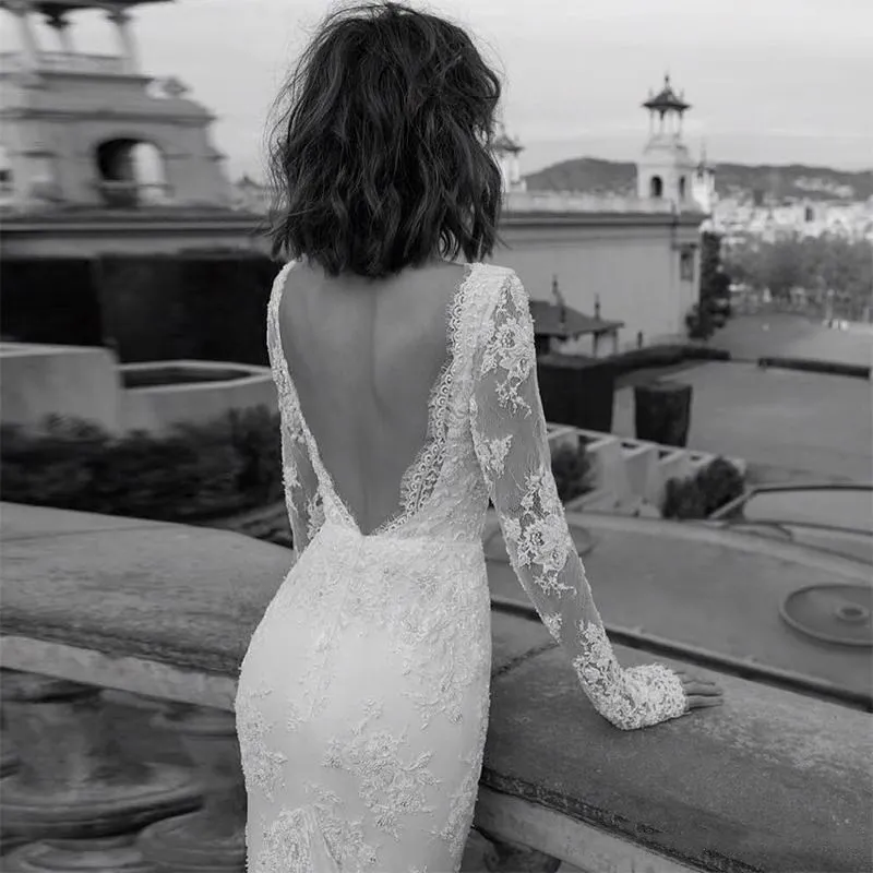 Ny ankomst Liz Martinez Sheer Långärmad Lace Bröllopsklänning Bridal Sexig Backless Court Tåg Vintage Boho Mermaid Bröllopsklänningar