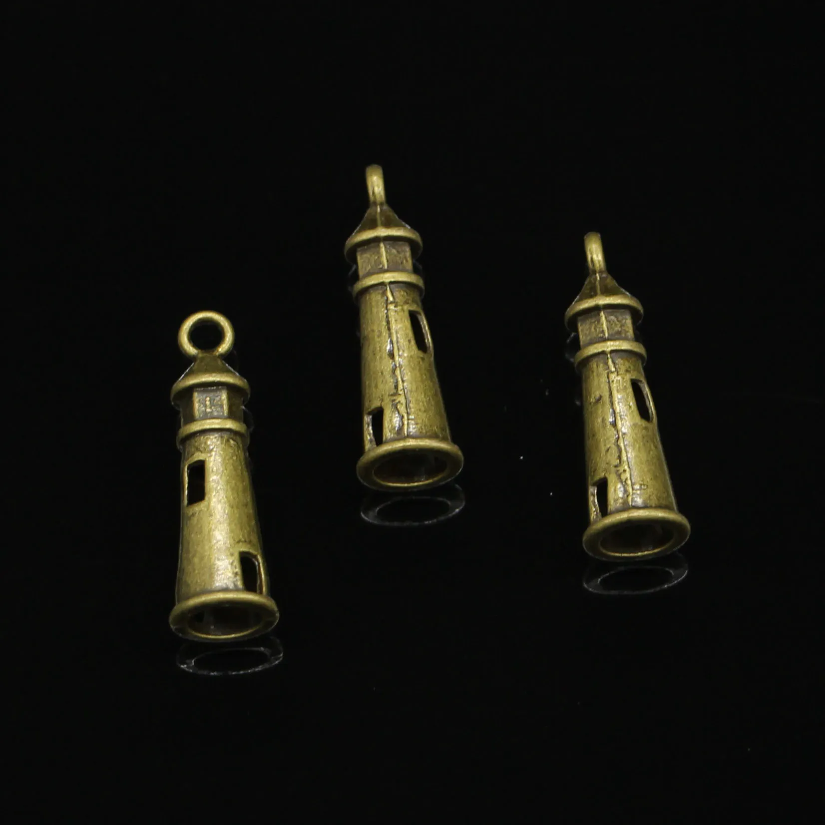 80 pièces en alliage de Zinc breloques Antique Bronze plaqué creux 3D phare breloques pour la fabrication de bijoux bricolage pendentifs faits à la main 25*8mm