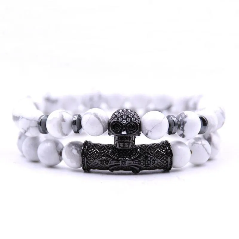Varm försäljning 2st / set svart färg skalle huvud lava turkos natursten pärlor män armband smycken set charm armband