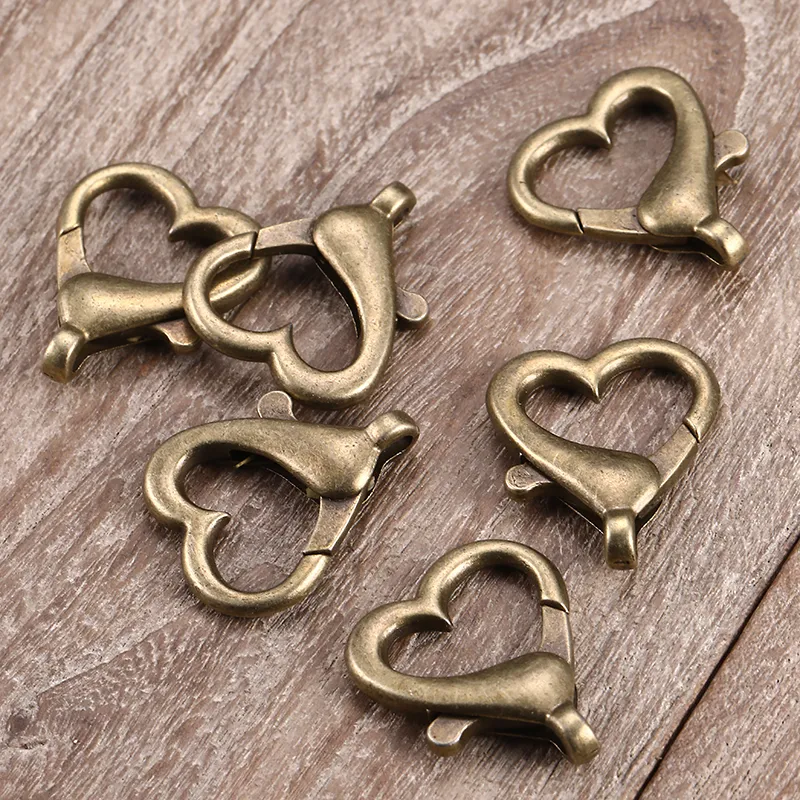 100 pezzi 22X26mm Risultati dei monili di modo bronzo antico a forma di cuore chiusura a moschettone Ganci per catena collanabracciale