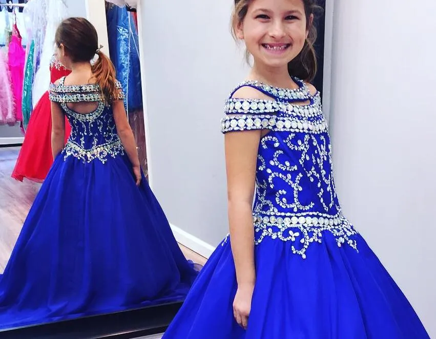 2018 Royal Blue Girls Pagant Klänningar Kristaller Beaded Cap Sleeves Backless Princess Ball Gown Kids Formal Wears Flower Girl Dress