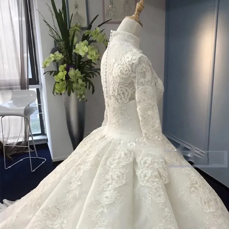 Abiti da sposa musulmani a maniche lunghe di alta qualità Collo alto Gonna gonfia Graziosi abiti da sposa islamici in pizzo e tulle realizzati su misura