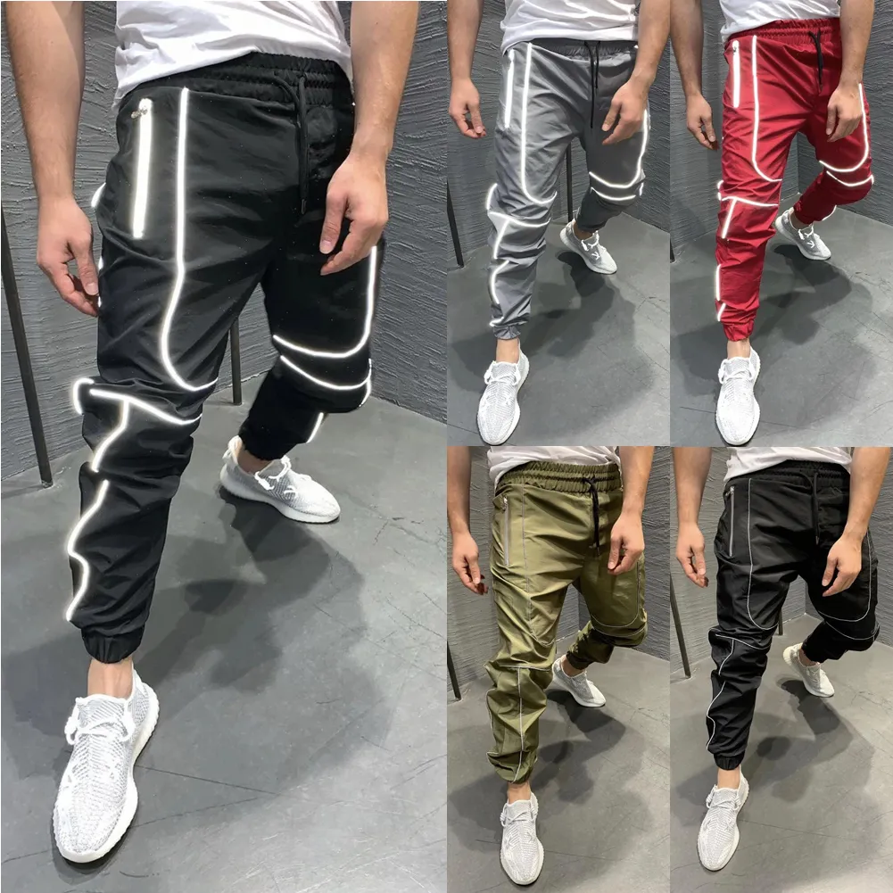 Otoño hombres de gran tamaño XXL Hip hop Harem Joggers pantalones masculinos Multi-bolsillo reflectantes rayadas de baile pantalón Pantalones Streetwear