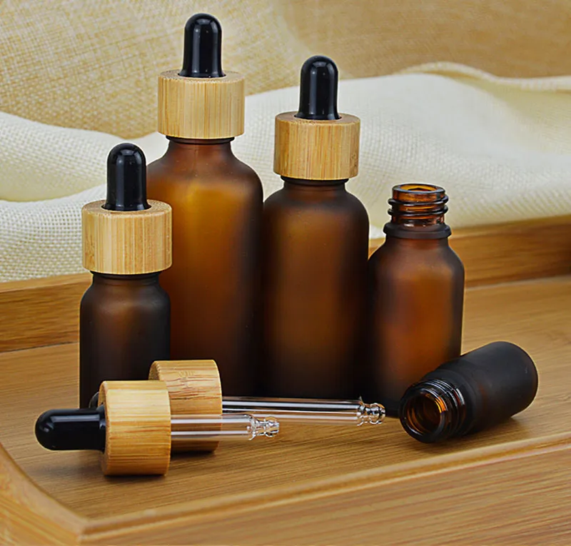 5 10 15ml 30ml 50ml Frostat / Clear Amber Glass Dropperflaska med Bamboo Cap 1oz Bamboos Essential Oil Bottles