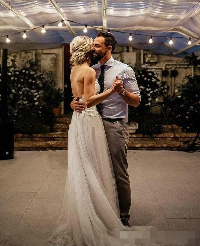 Modest Backless A Line Wedding Dress Lace Applique Tulle Sweep Train Boho  Beach Gown With Spaghetti Straps From Babydress126, $138.19 | DHgate.Com