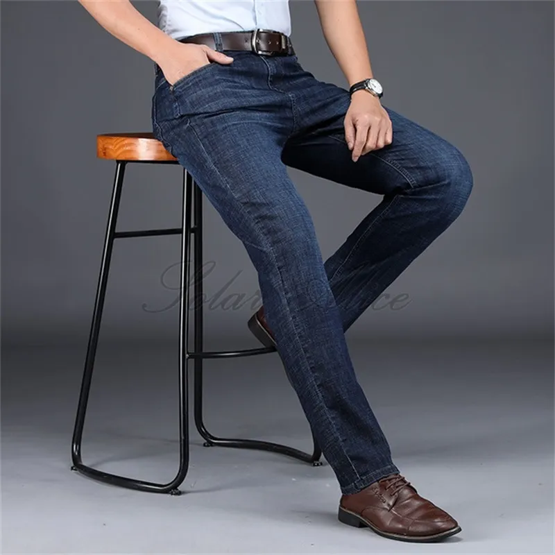 Free shipping 2020 men's four seasons new high waist straight jeans business middle-aged loose quality denim trousers