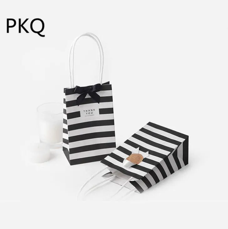 Small black and shop white gift bags