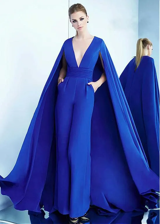 Dubai Royal Blue Jumpsuits Prom Klänningar med Caped Deep V Nacke Keyhole Back Formella Klänningar med Pocket Evening Wear Elegant Celebrity Dress