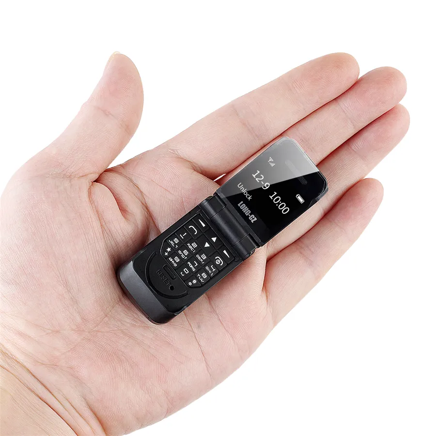 Supper Mini Flip Mobile Phone J9 0.66 "Minsta mobiltelefon Trådlös Bluetooth Dialer FM Magic Voice Handsfree hörlurar för barn