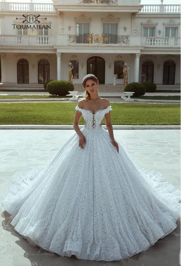 Wedding drees, bridal gown style and bespoke fashion, full-legth white  tailored ball gown in showroom, tailor fitting, beauty and wedding 29227957  Stock Photo at Vecteezy