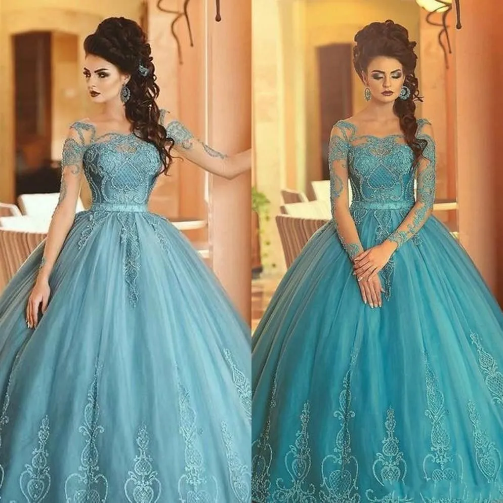 2020 Ny ankomst Lyxig bollklänning Prom Klänningar Lace Appliques Tulle Beaded Långärmad Puffy Sexig Tillbaka Evening Dress Party Gowns Wear