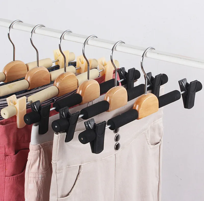 Set di appendini in legno con barra per pantaloni 10 pezzi