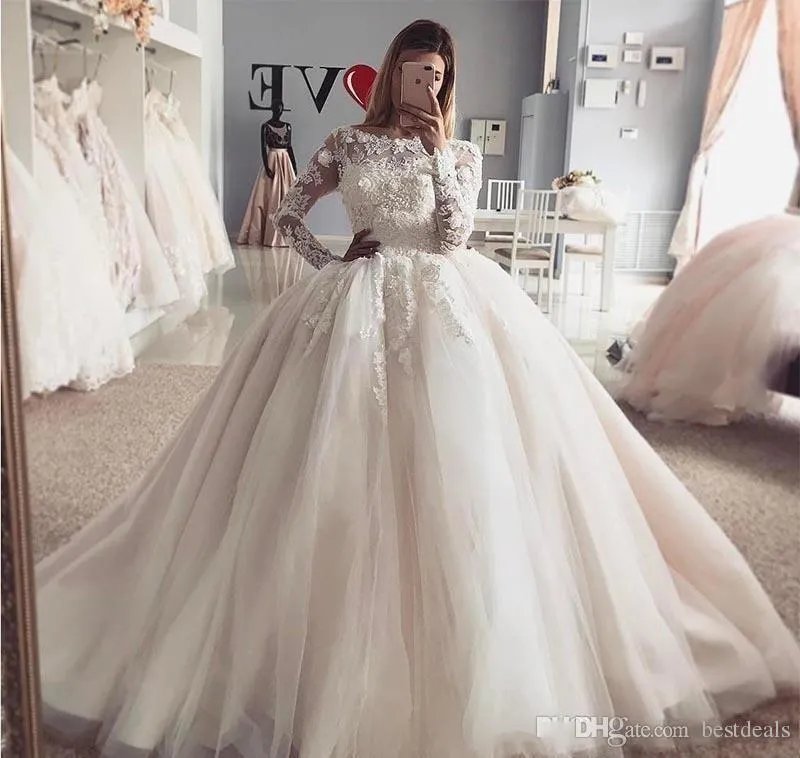 El más nuevo vestido de novia de princesa Vintage árabe de Dubái, vestido de novia de tul con apliques de encaje de manga larga transparente hinchado, vestido de novia hecho a medida