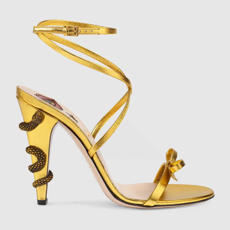 شحن مجاني 2024 طرازات المنصة لاكي كلاسيكية التصميم الساخن مثير الشفاه Snake Stiletto Bow-Tie Open Open Strap 10.5cm Heels Sandal Gold Col 34-43