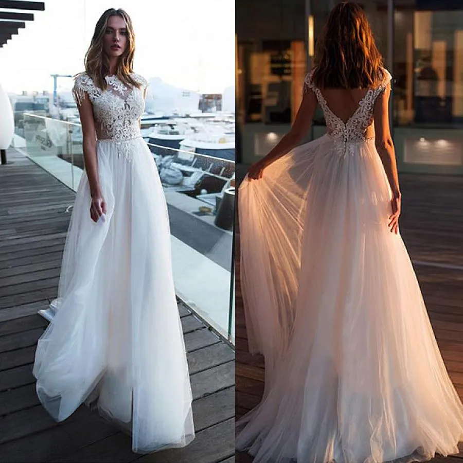 Nouvelles robes de mariée magnifiques appliquées en dentelle avec manches courtes Boho robes de mariée voir à travers grande taille pas cher