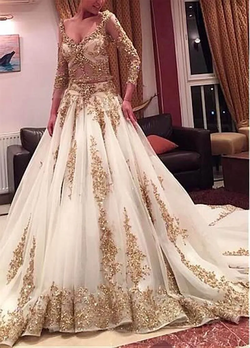 sheer gold wedding dress Elegant Satin Wedding Dress with Sheer Long Sleeves and Crystal Accents 14 / Solid Ivory main image 1