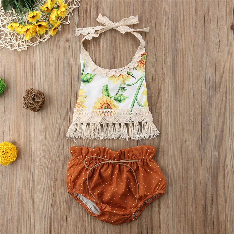 ノースリーブの夏のかわいいヒマワリの女の子の服タッセル背中のトップドットのショートアウトフィット2個の新生児の赤ちゃん女の子服セット
