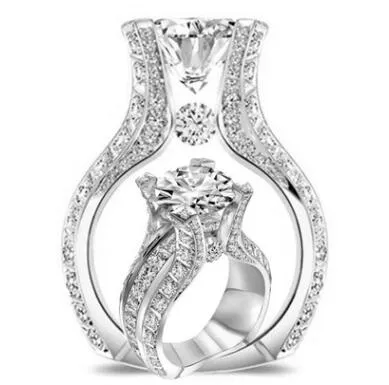 Commercio all'ingrosso di anelli di nozze placcati in rodio reale con intarsio di gioielli affascinanti del nuovo temperamento elegante della nuova sfilata di moda