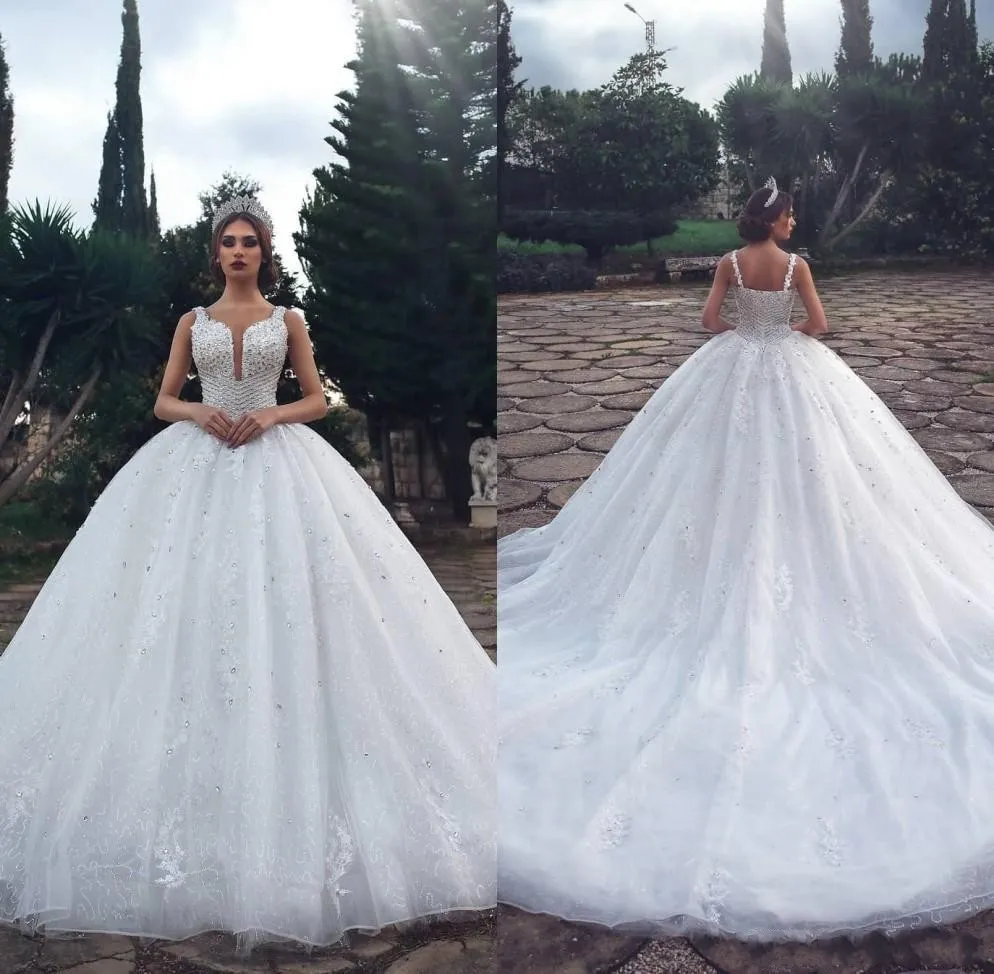 Vestidos de novia africanos A Línea Tul Lace Tul Appliques Spaghetti Illusion Court Train Tamaño grande Custom Sexy Cheap Bridal Gowns