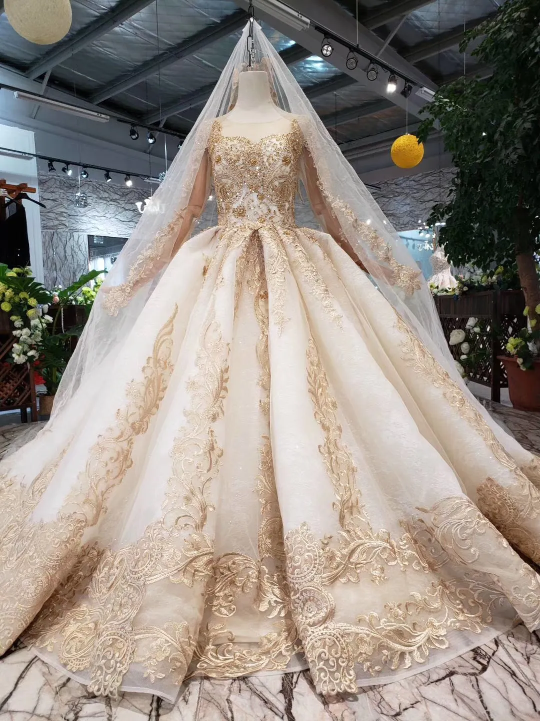 Elegant Arabic kourtney wedding dress with Gold Appliques, Full Sleeves, and Cathedral Train - 2019 Gown Bridal G G