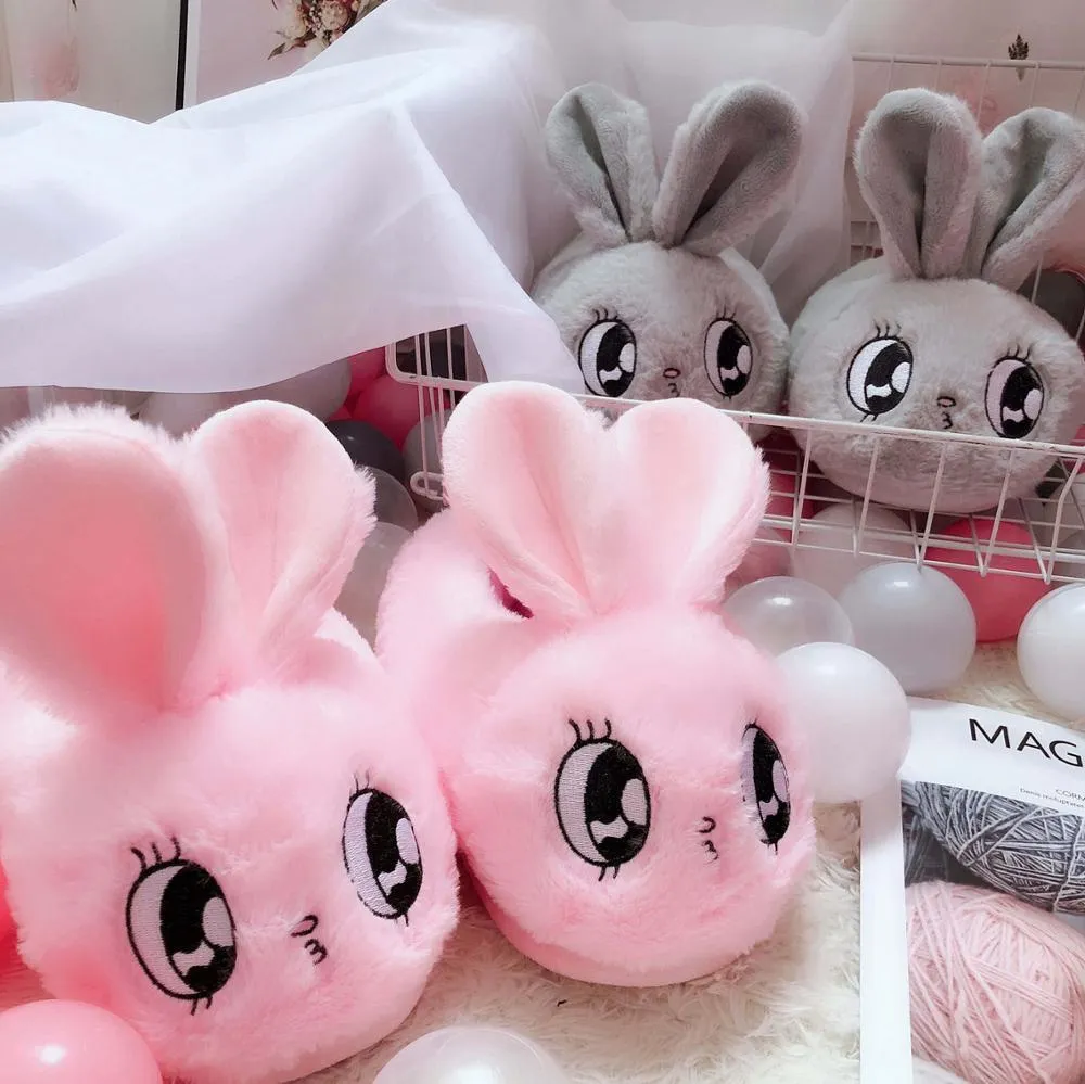 Slippers de lapin rose pantoufles de peluche animale mignonne flou