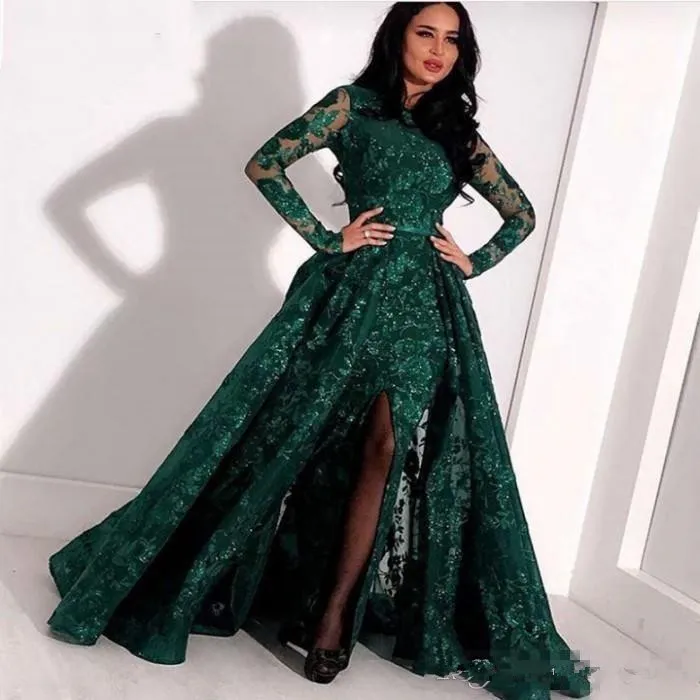 2020 Hunter Green Mermaid prom dress with slit with Overskirt, Long Sleeves, Jewel Neckline, and Full Lace Detailing - Arabic Evening Gown
