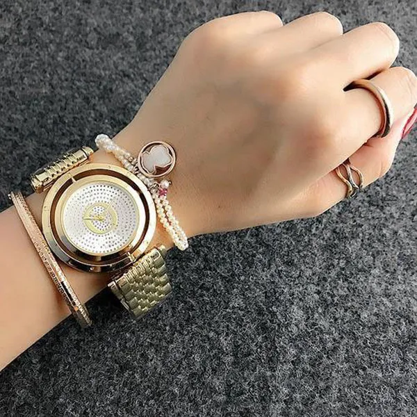 Montre-bracelet de marque de mode pour femmes et filles, cristal, cadran rotatif, style acier, bracelet métallique, montres à Quartz P18