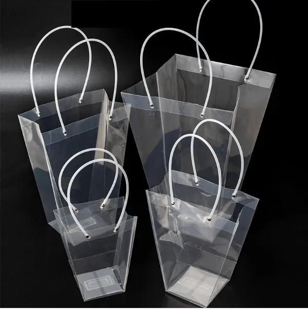 Trapezförmiger transparenter Geschenk-Beutel-Plastikspeicher-Handtaschen-PVC-Blumen-Beutel-Geschäfts-Verpackentaschen-Partei-Feiertags-Blumen-Handtaschen neues GGA2565