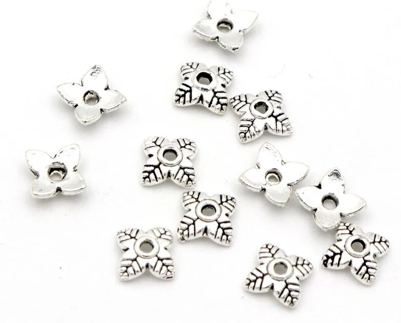 1000pcs tibetansk antikvitet silverblad blomma lös sparare slutpärla kepsar för smycken gör fynd nålarbete DIY tillbehör