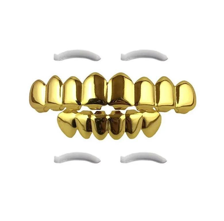 Hip Hop Gold Grillz 2023 Ny mode Miljöguldpläterade tandgrillar Partihandel Halloween Tänder hängslen 2-stycksuppsättning