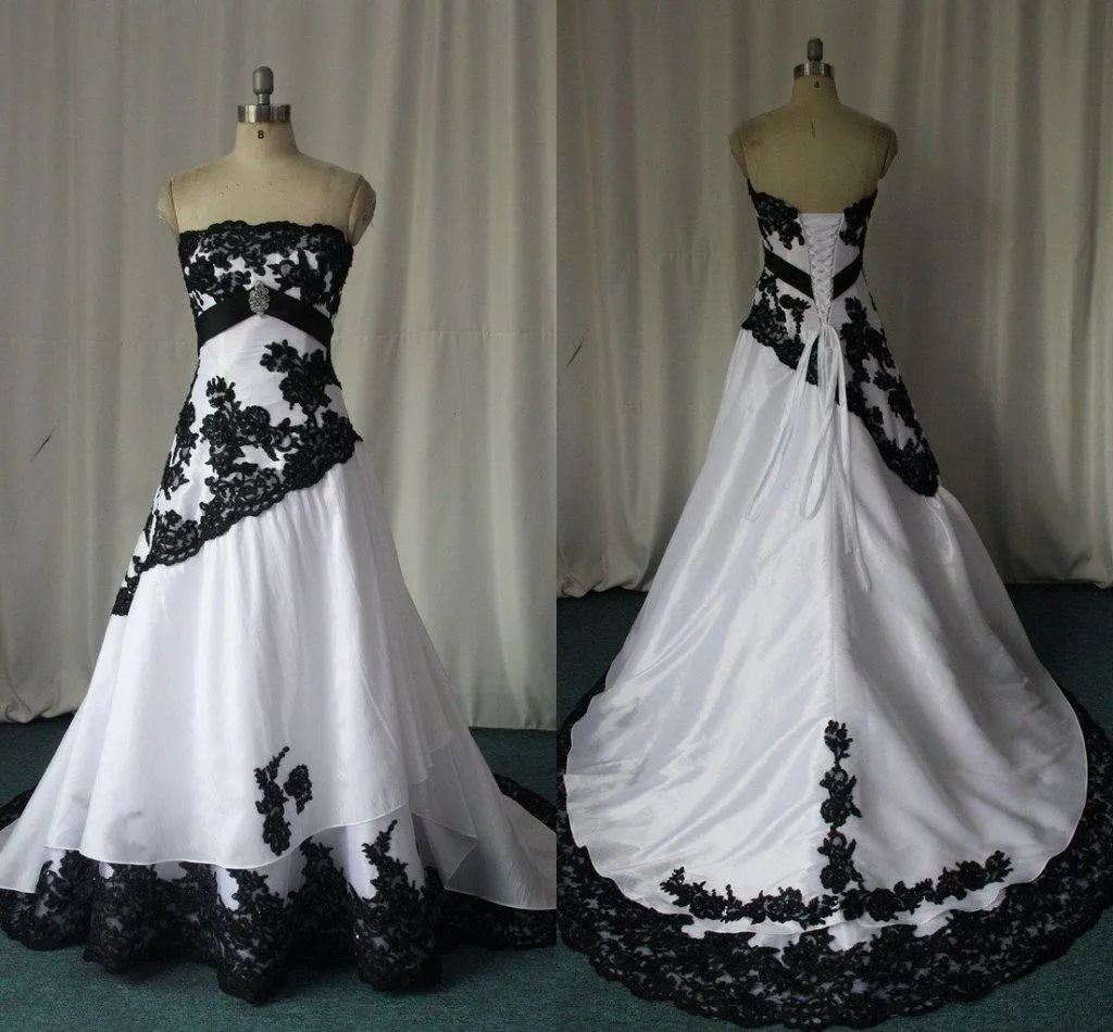 黒いレースのトレッジのストラップレスホワイトサテンのウェディングドレスの長い伝統的な非伝統的なウェディングガウンプラスサイズ